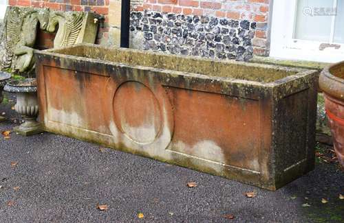 A LARGE COMPOSITION STONE TERRACE BOX PLANTER, IN THE REGENC...