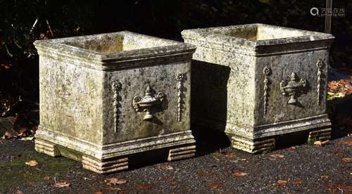 A PAIR OF COMPOSITION STONE SQUARE PLANTERS, IN THE NEOCLASS...