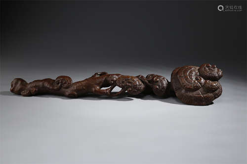 An Agarwood Ganoderma Shaped Ruyi Sculpture.