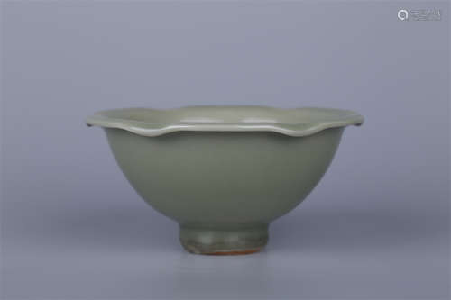 A Porcelain Bowl with Flower Shaped Rim.