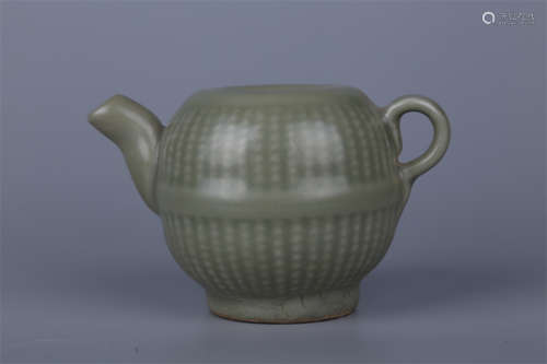 A Green Celadon Teapot with String Design.