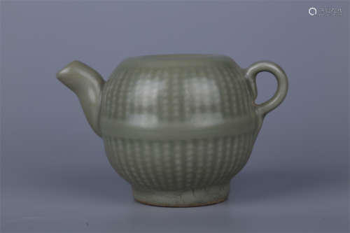 A Green Celadon Teapot with String Design.