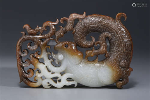 An Antique Jade Auspicious Beast Sculpture.