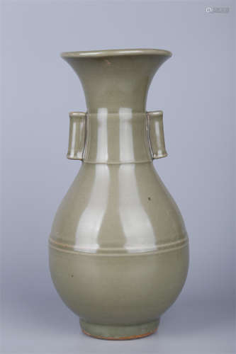 A Porcelain Bottle with Pierced Ears.