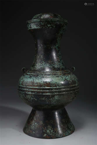 A Bronze Lidded Pot with String Deisgn.