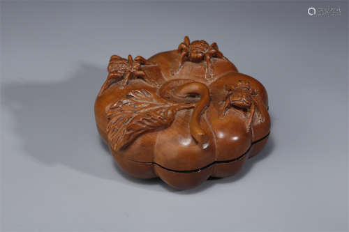 A Boxwood Ridged Melon Shaped Inkstone.