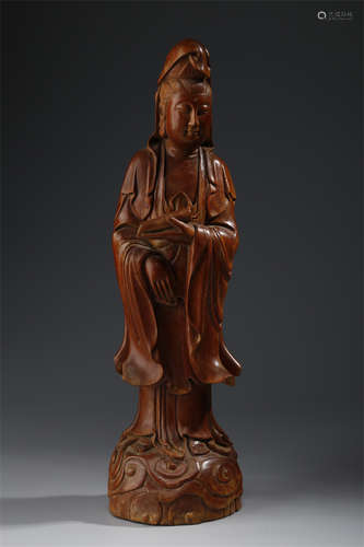 A Boxwood Avalokitesvara Statue.