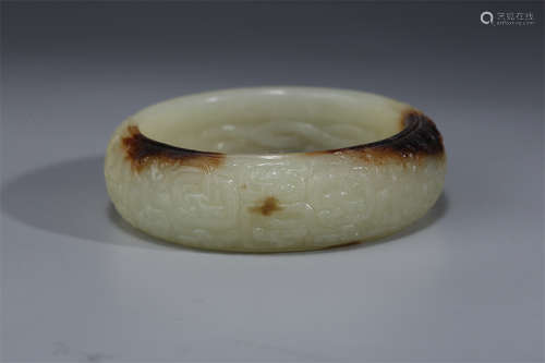 An Antique Jade Bangle.