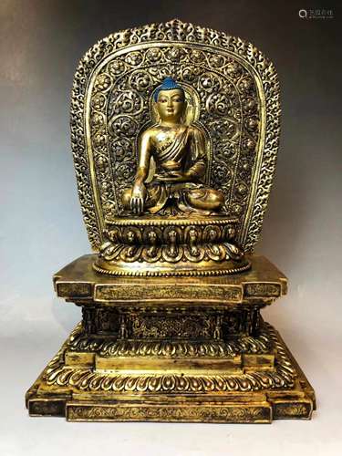 A MING DYNASTY GILT BRONZE SAKYAMUNI BUDDHA