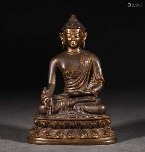 A MING DYNASTY BRONZE GILT BUDDHA