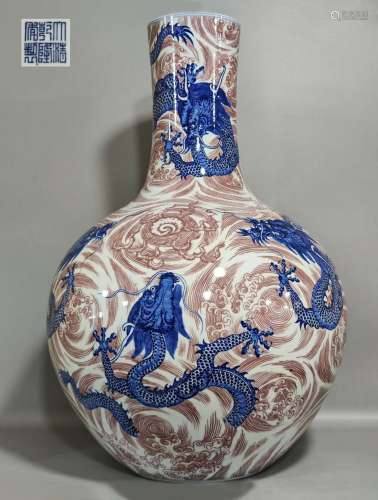 A Qing Dynasty blue and white underglazed red dragon pattern...
