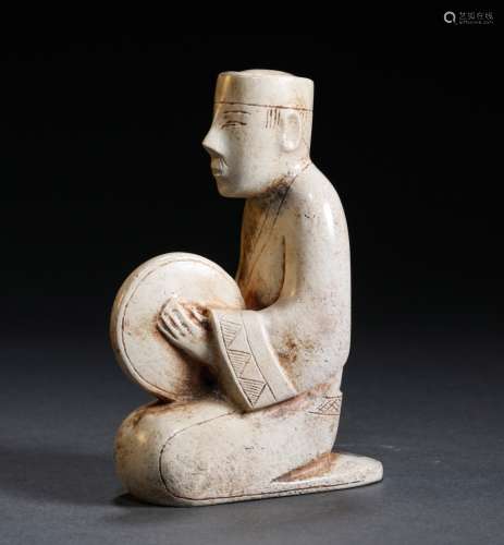 A TANG DYNASTY CHICKEN BONE WHITE FIGURE
