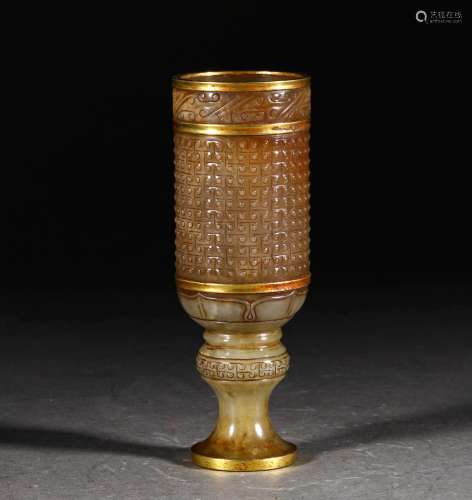 A WARRING STATES PERIOD JADE CUP WRAPPED GOLD