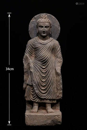 A Gandhara Buddha  standing statue of grey schist stone