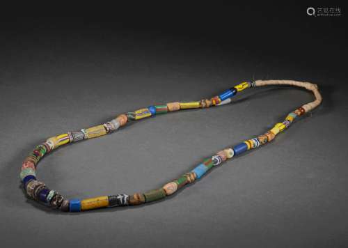 A STRING OFWARRING STATES PERIOD COLORED GLAZE NECKLACE