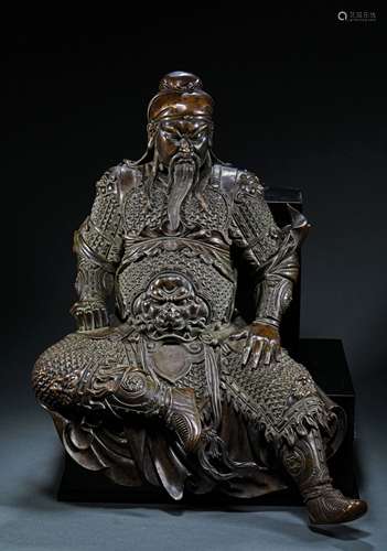 A MING DYNASTY GUANGONG BRONZE STATUE