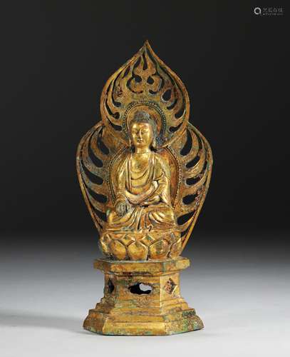 A TANG DYNASTY BRONZE GILT BUDDHA STATUE