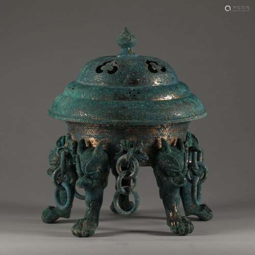 A TANG DYNASTY bronze gilt incense burner