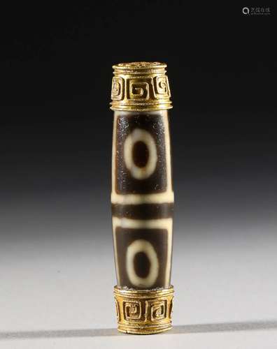 A TANG DYNASTY DZI WRAPPED GOLD