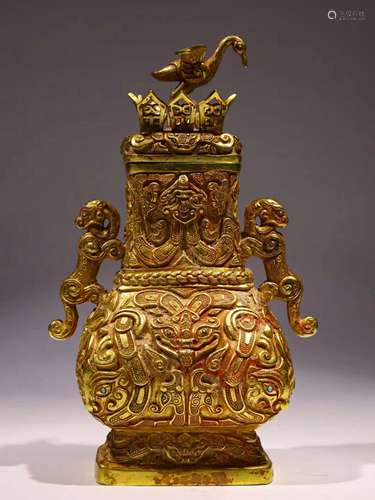 A TANG DYNASTY PURE GOLD  BEAST FACE PATTERN DOUBLE EARS BOT...