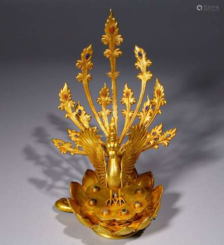 A QING DYNASTY BRONZE GILT PHOENIX CROWN