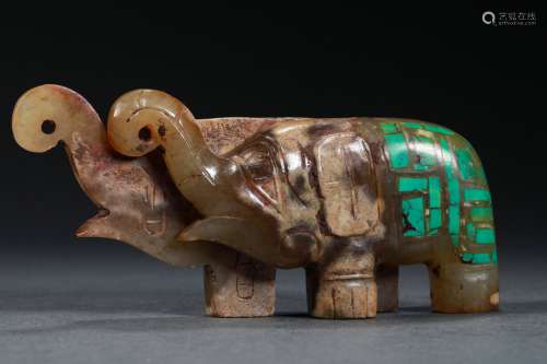A WARRING STATES PERIOD JADE ELEPHANT