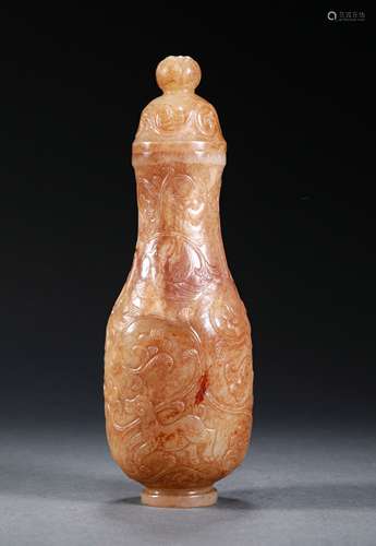 A WARRING STATES PERIOD JADE BOTTLE