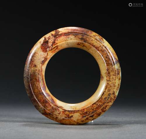 A WARRING STATES PERIOD JADE RING