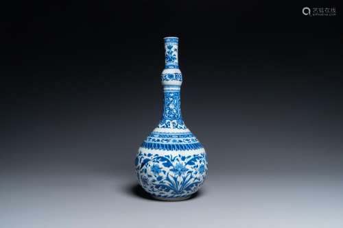 A CHINESE BLUE AND WHITE BOTTLE VASE IN TRANSITIONAL STYLE, ...
