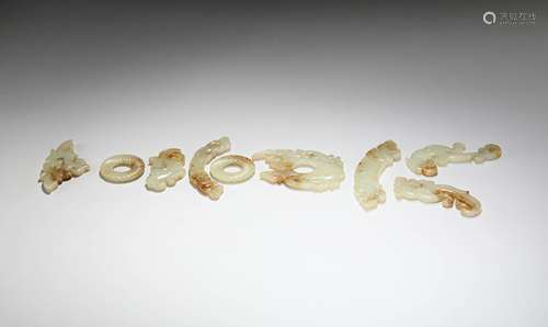 A SET OF WARRING STATES PERIOD HETIAN JADE PENDANTS