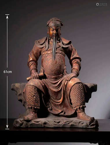 A QING DYNASTY WOODCARVING AND GOLD LACQUER GUAN YU STATUE