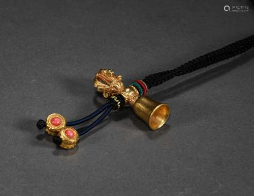 A QING DYNASTY PURE GOLD DHARMA PENDANT