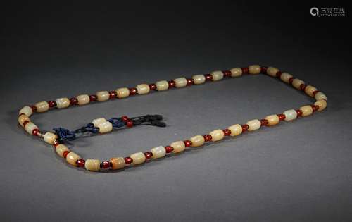 A STRING OF TANG DYNASTY JADE NECKLACE