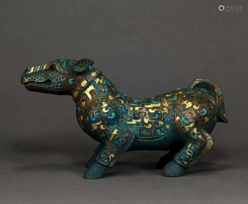 A WARRING STATES PERIOD AUSPICIOUS BEAST DECORATION