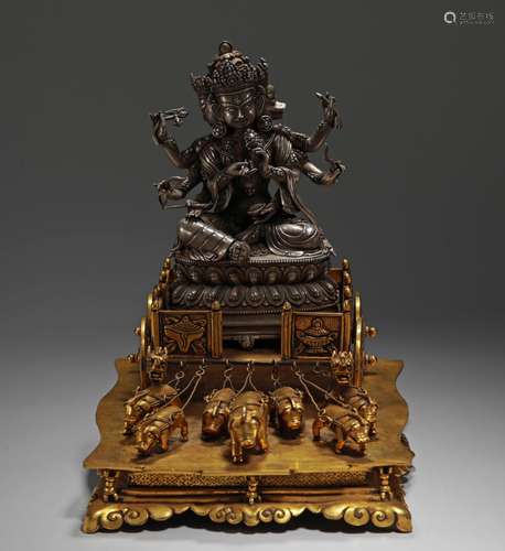 A MING DYNASTY GILT BRONZE DHARMAPALAS STATUE