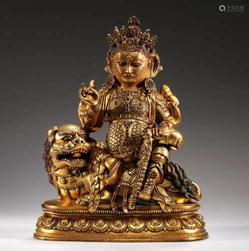 A MING DYNASTY Bronze gilt GOD OF WEALTH statue