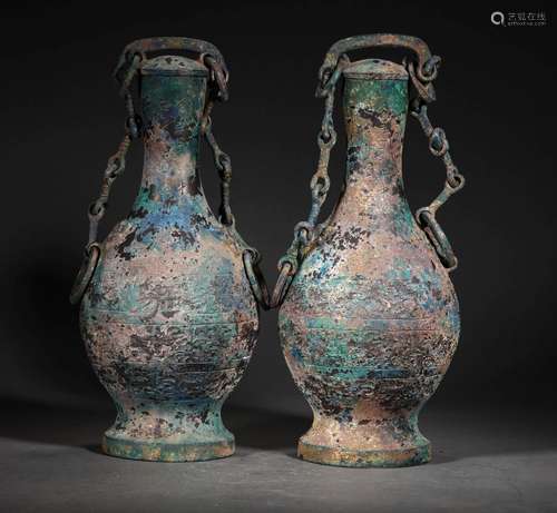 A WARRING STATES PERIOD BRONZE GIRDER BOTTLES