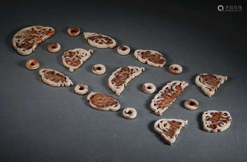 A SET OF WARRING STATES PERIOD HETIAN JADE PENDANTS