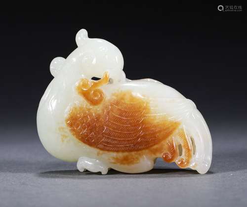 A QING DYNASTY HETIAN JADE SEED MATERIAL BIRD