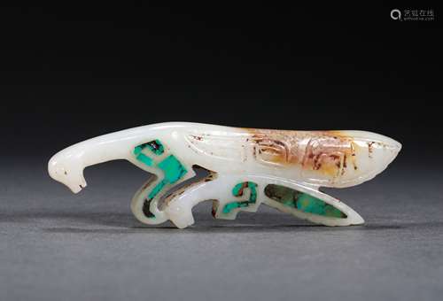 A WARRING STATES PERIOD JADE ELEPHANT MANTIS