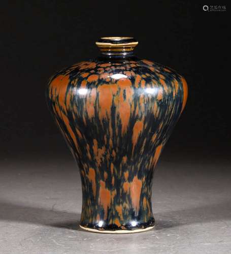 A SONG DYNASTY RUST FLOWERS PLUM BOTTLE