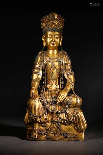 A LIAO DYNASTY BRONZE GILT GUANYIN STATUE