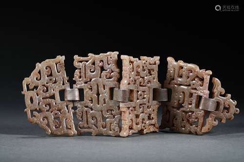 A SET OF WARRING STATES PERIOD HETIAN JADE PENDANTS