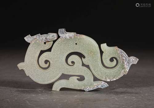 A WARRING STATES PERIOD HETIAN JADE DRAGON