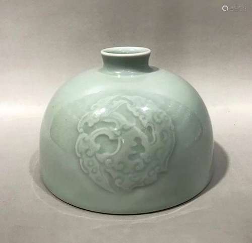 A Qing Kangxi powder green glaze embossment Taibai ZUN