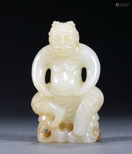 A TANG DYNASTY HETIAN JADE FIGURE