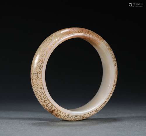 A TANG DYNASTY HETIAN JADE INLAYING GILD BRACELET