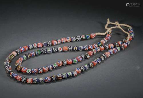 A STRING OF WARRING STATES PERIOD colored glaze NECKLACE