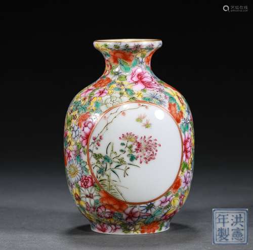 A REPUBLIC OF CHINA HONGXIAN Powder enamel vase with flowers...