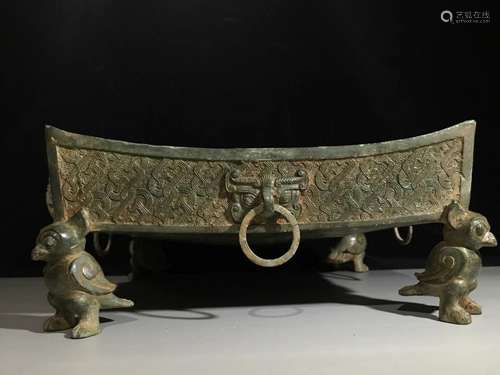 A WARRING STATES PERIOD BRONZE DRAGON BEAST FACE BURNER